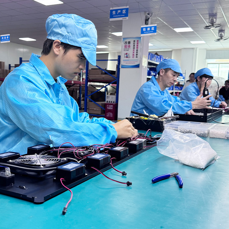 RICOVSUN technicians assembling red light therapy panel electrical components